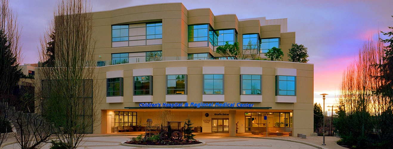 Seattle Children's Janet Sinegal Patient Care Building exterior at sunset